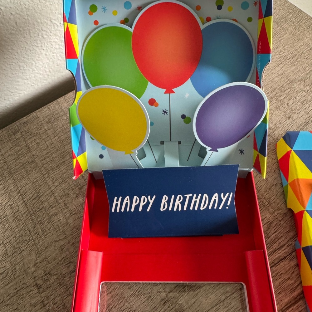 Colorful Geometric Gift Box with Red Ribbon - Picture 3 of 9